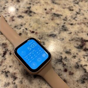 Rose Gold Apple Smartwatch with Tan Band